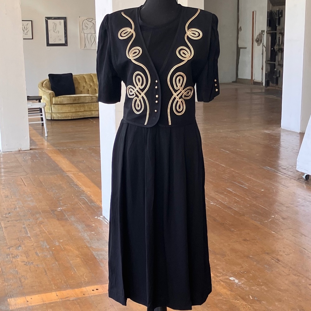 JBS vintage, black, and gold medal length dress